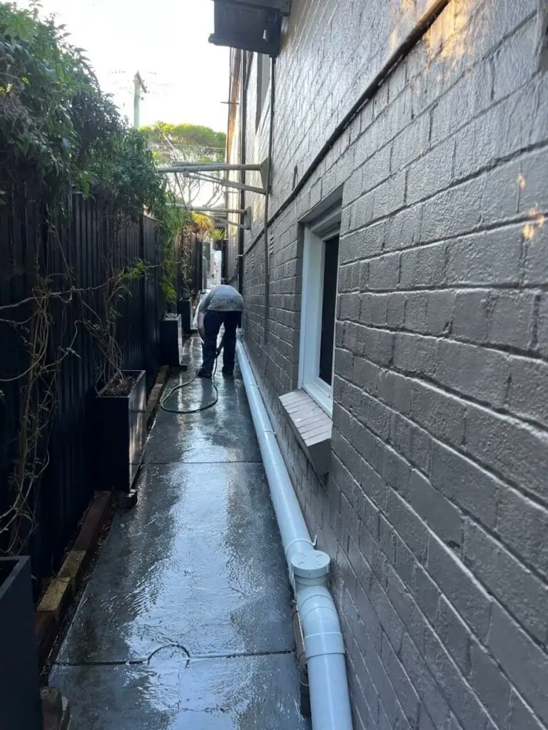 New stormwater pipe running along a side passage